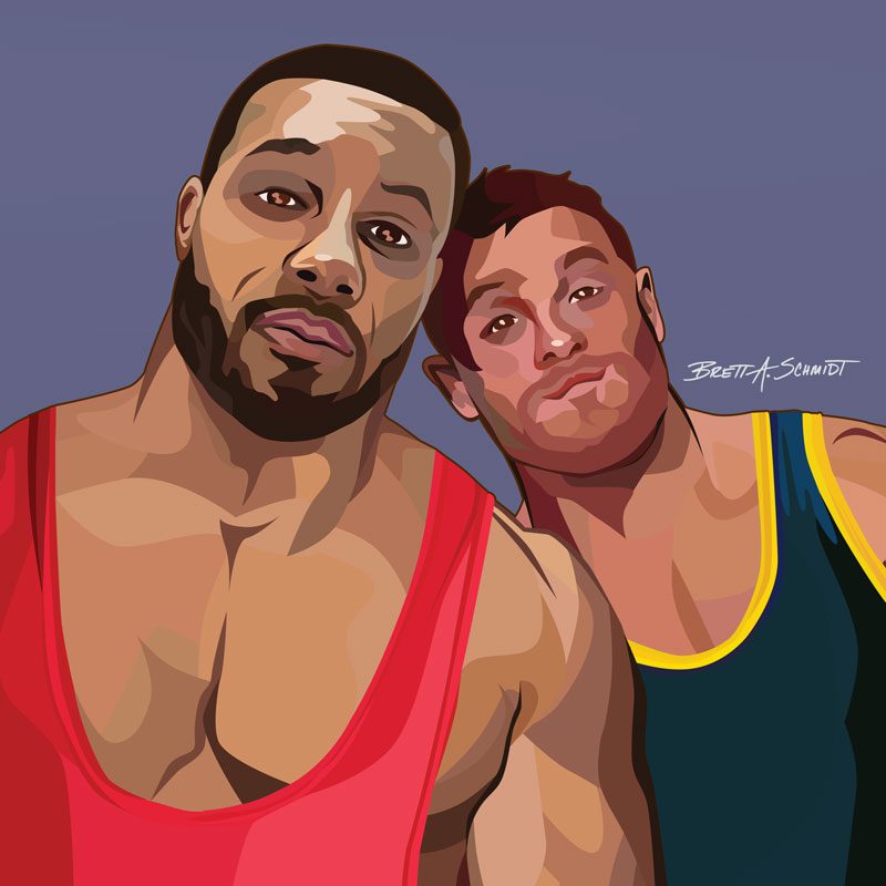 Two males wearing singlets